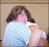 Jordan hugging Aaron Olson after there last game victory